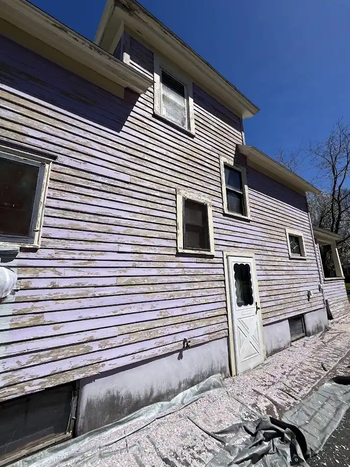 After scraping — loose paint fully removed and surface prepared
