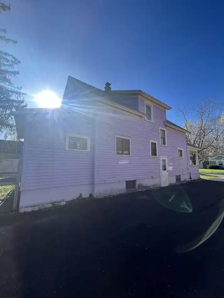 Exterior house before painting — original surface condition